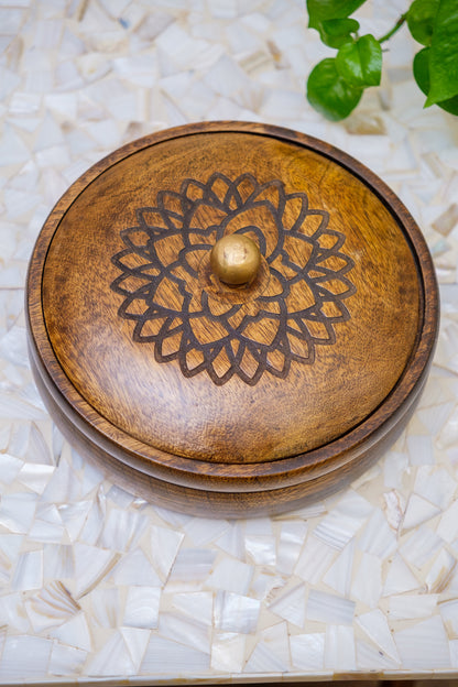 Handcrafted wooden box with engraved floral mandala on a mother of pearl mosaic surface