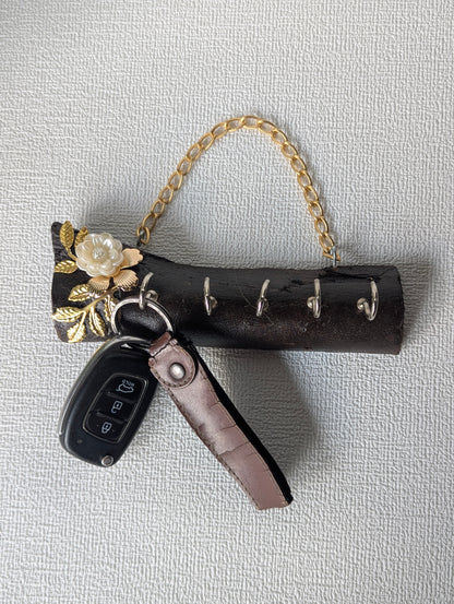 Handcrafted wooden wall key holder with mother of pearl floral inlay and gold chain