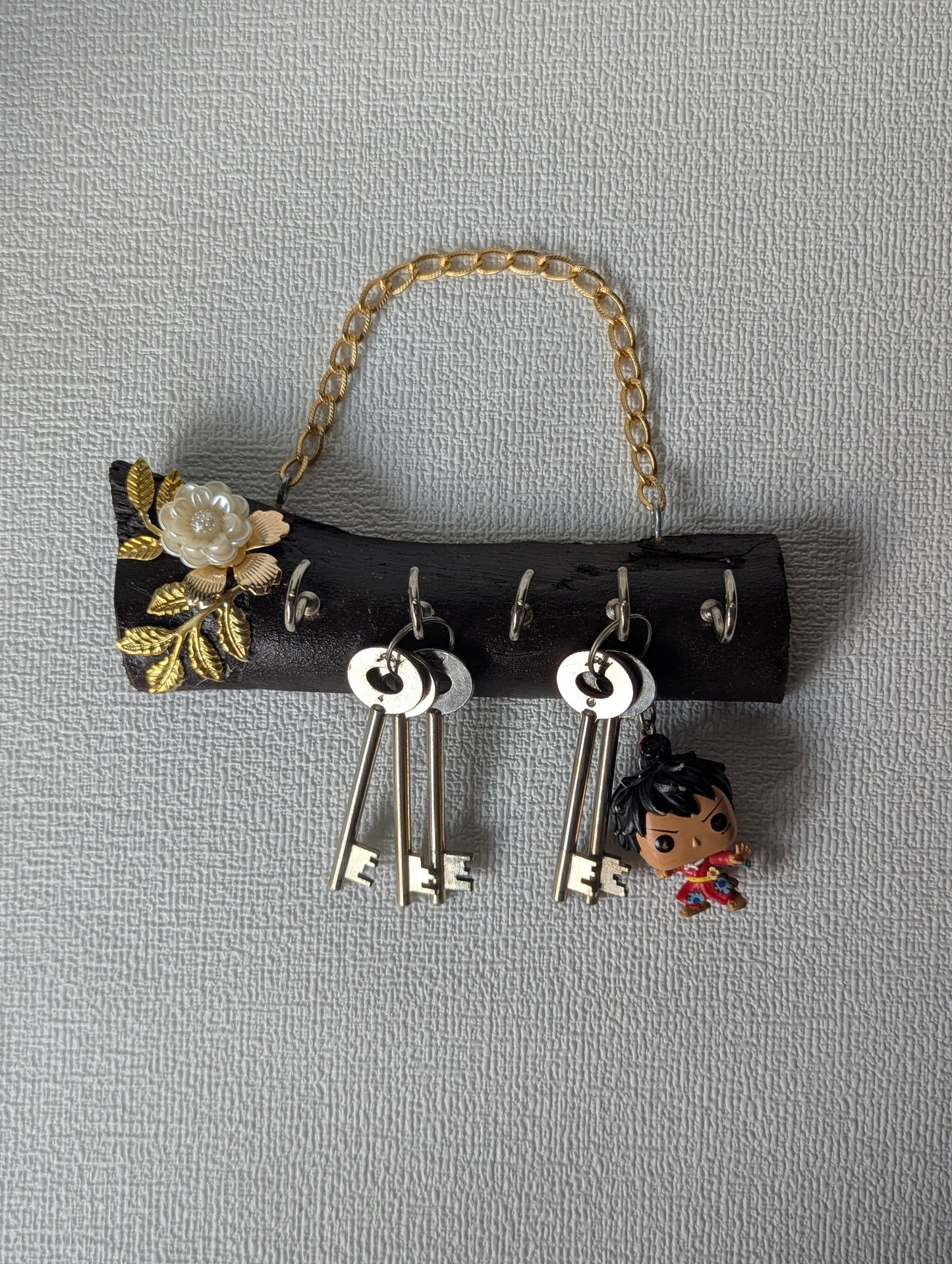 Handcrafted wooden key holder with Mother of Pearl floral accent and hanging keys