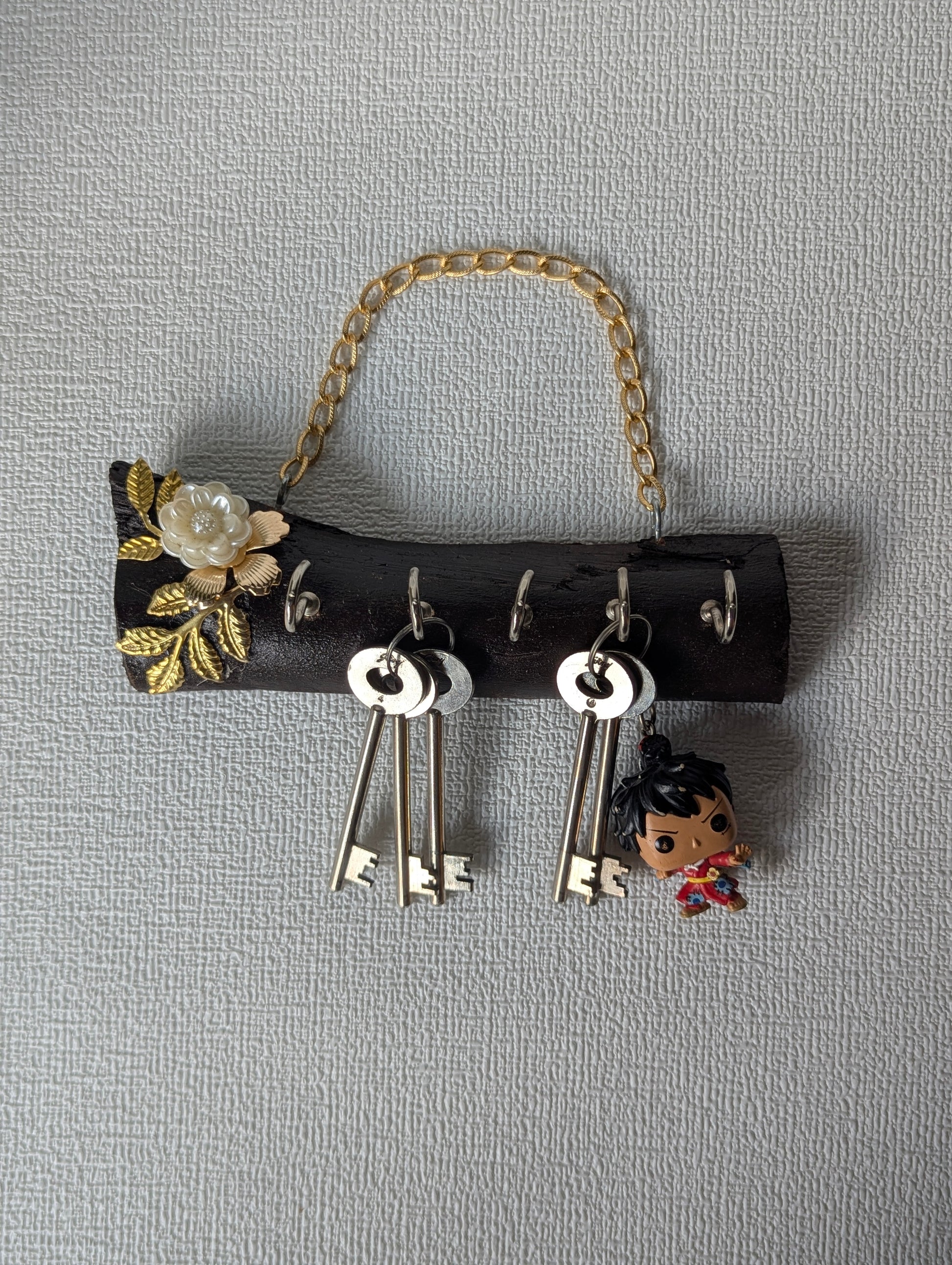 Handcrafted wooden key holder with Mother of Pearl floral accent and hanging keys