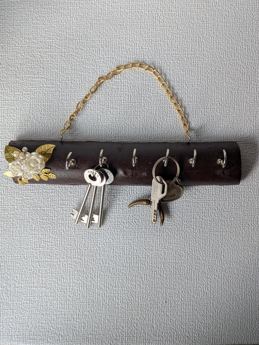 Handcrafted wooden key holder with floral Mother of Pearl decor and hanging keys