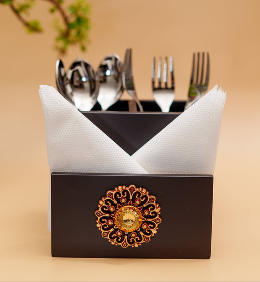 Handcrafted black wooden cutlery holder with ornate gold floral design, napkins and utensils