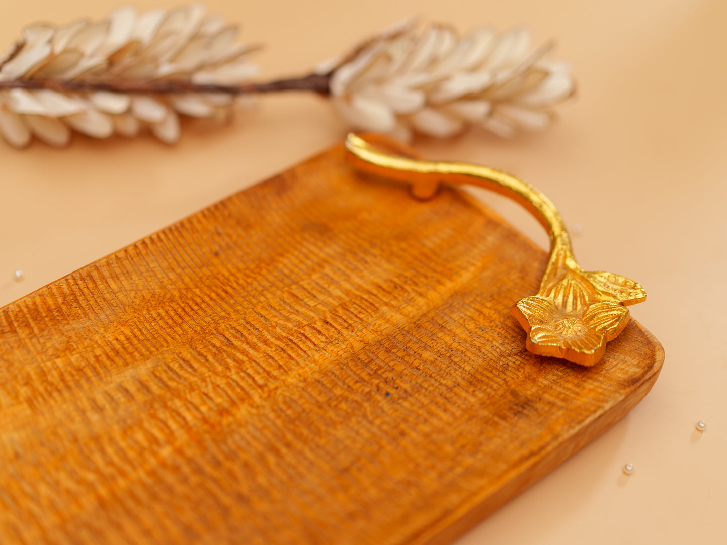 Handcrafted wooden serving tray with gold floral accent, elegant Indian home decor